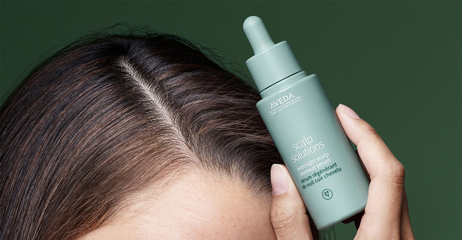 Shop Aveda's scalp solutions overnight scalp renewal serum improving scalp hydration by 51% in one night.